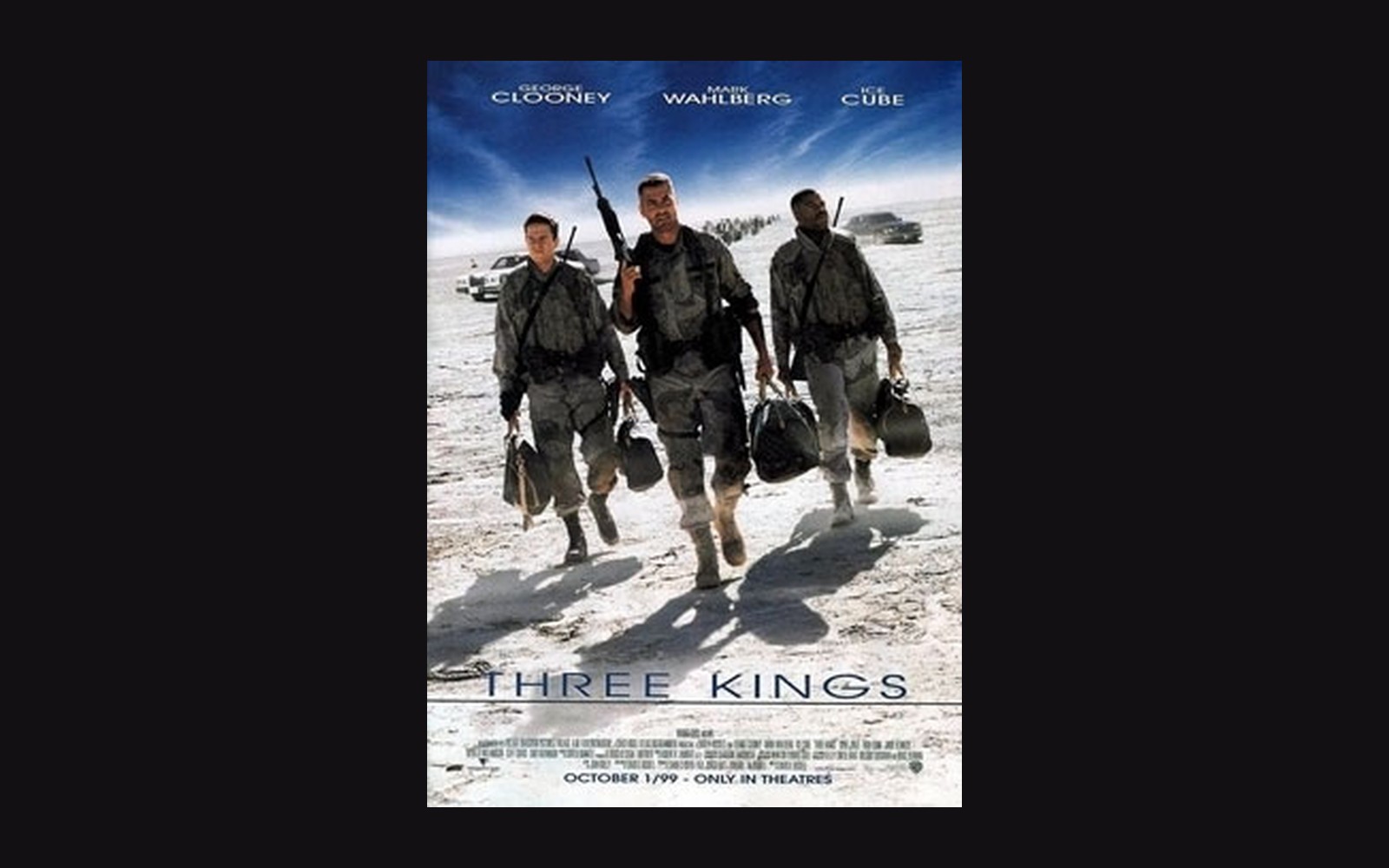 Movie poster for Three Kings showing three soldiers carrying duffel bags across a desert
