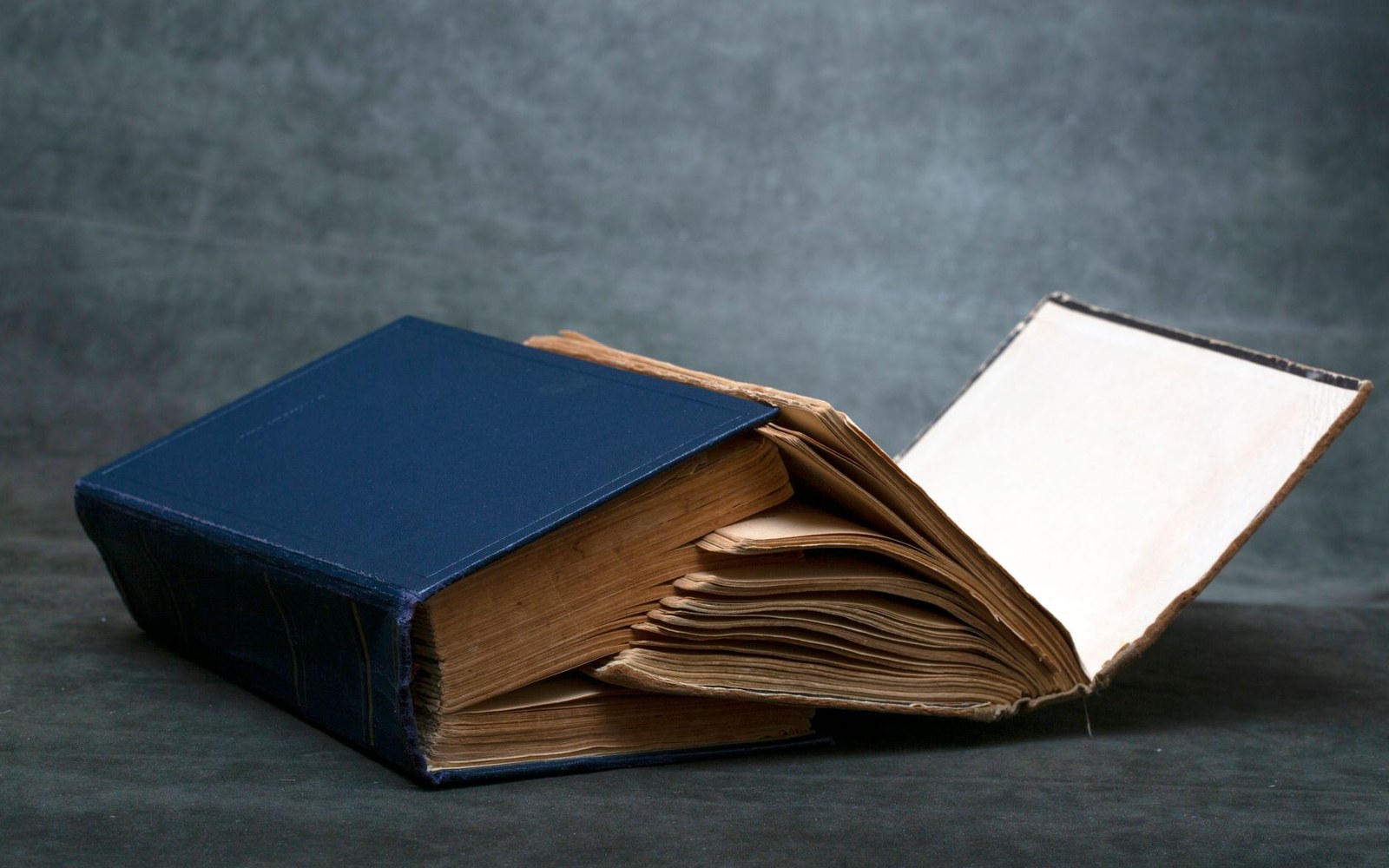 The 2003 Scribner hardback of Jarhead by Anthony Swofford photographed flat on a table in raking light, spine visible